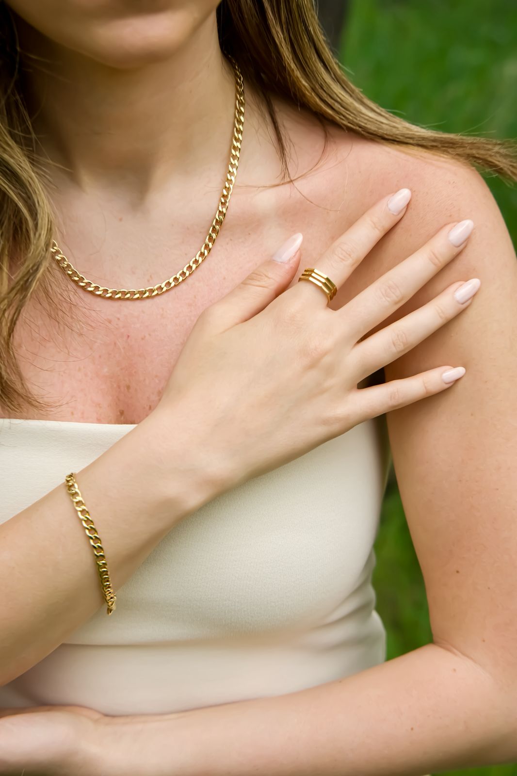 By Tina Khoury gold jewelry set